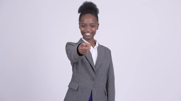 Young Happy African Businesswoman Pointing To Camera