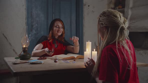 Soothsayer Practicing Divination with Rune Stones