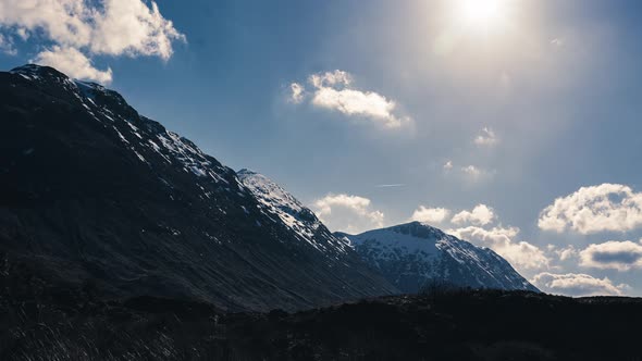 Stunning Time lapse of clouds going past mountains 4K