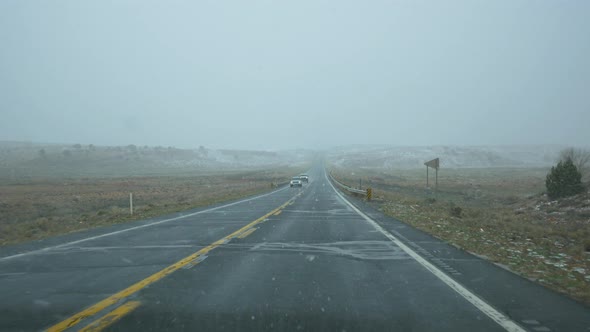 Snowing on the road