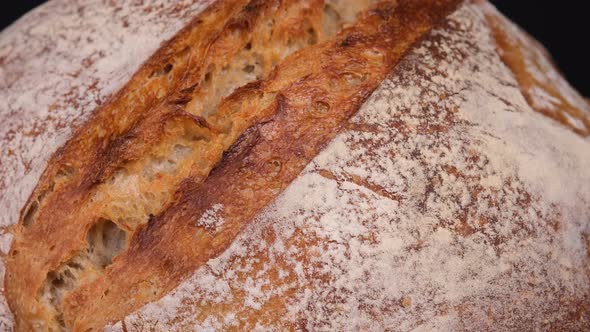 Close Up Of Freshly Baked Sourdough Bread, Revealing Light To Dark.