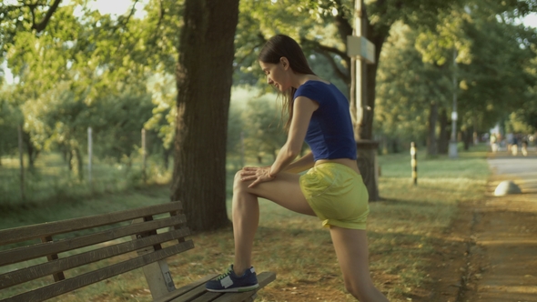 Fitness Woman Runner Stretching Legs Before Run