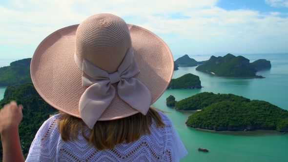 Female Traveler Enjoying View of Tropical Islands at Angthong National Marine Park in Thailand