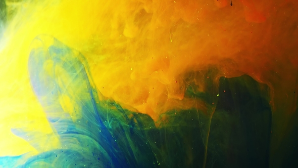 Colorful Rainbow Paint Drops From the Bottom Mixing in Water alt