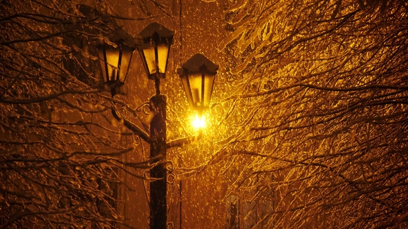 Amazing Snowfall in the Light of a Street Lamp.