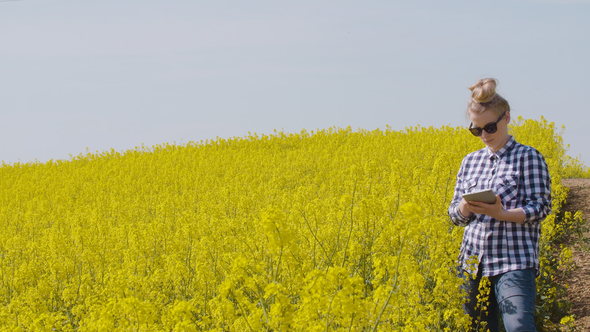 Farmer Using Digital Tablet