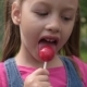 Cute 5-Year-old Girl with a Lollipop - VideoHive Item for Sale