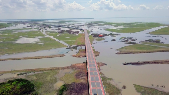 Aerial View of Chaloem Phrakiat - the Longest Bridge in Thailand. Top View of Highway Road at Thale