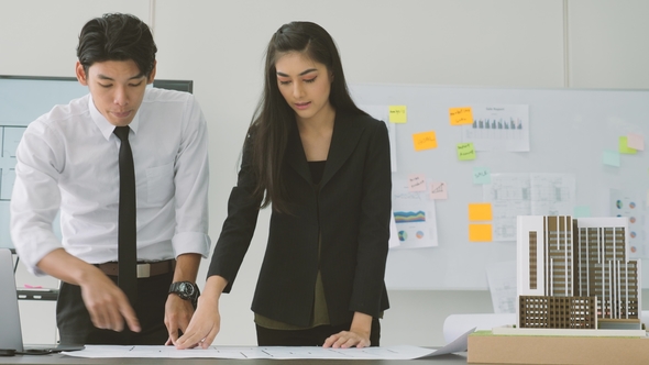 Team of Creative Architects Working Together in a Architect Studio