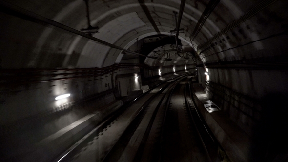 Fast Underground Train Riding in a Tunnel of the Modern City