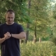 Man Runner with Fitness Tracker in the Park - VideoHive Item for Sale