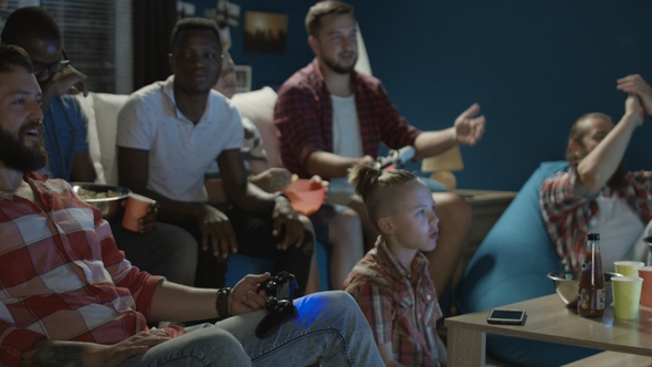 Diverse People Entertaining with Videogame