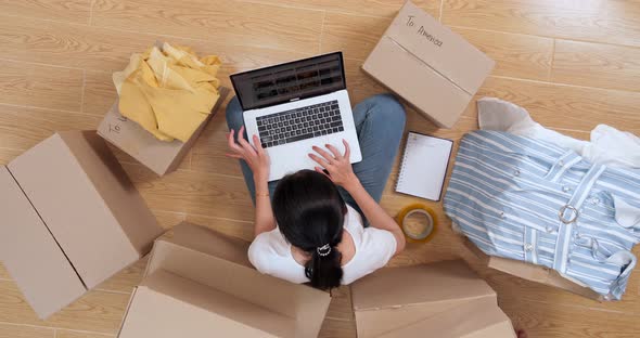 Young Asian Small Business Owner Woman At Home Office