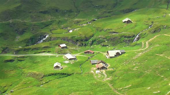 Isolated houses in the slopes of the Swiss Alps. Grindelwald First.