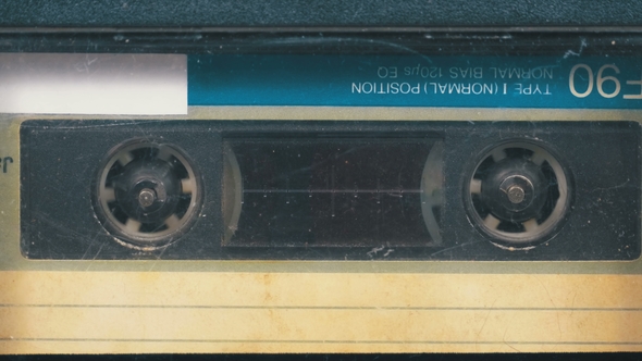 The Vintage Audio Cassette in the Tape Recorder Rotates