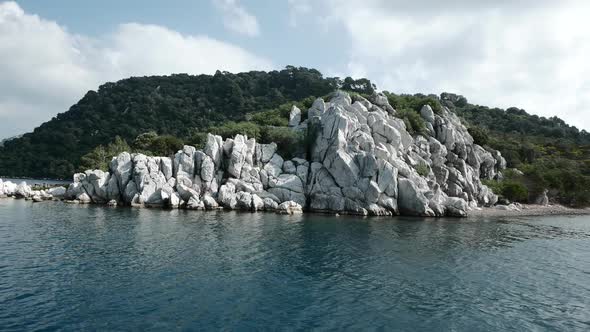 Looking at the Cliffed Land During Sailing.