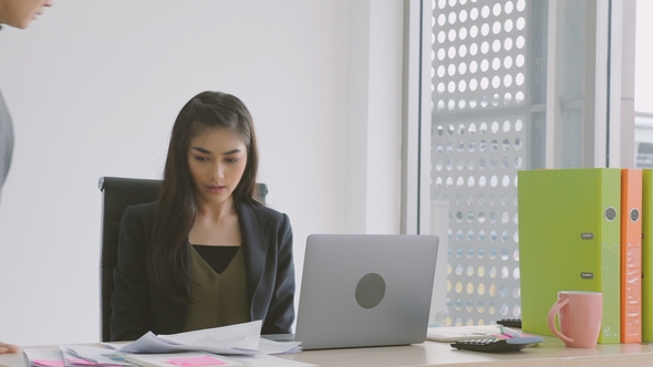 Businesswoman Getting Rebuke From His Female Boss in the Office.