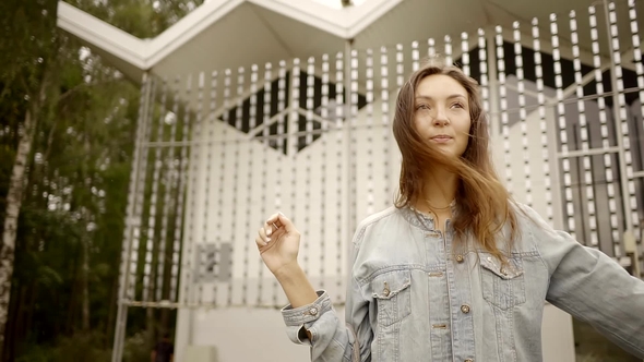 Freedom Loving Young Woman Is Strolling Outside Near Forest Her Hair Is Waving in the Wind