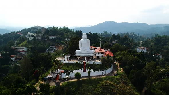 Aerial of Big White Buddha statue in Kandy. Bahirawakanda Vihara Buddha Statue, Kandy, Sri lanka