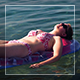 Girl Relaxing In The Sea - VideoHive Item for Sale