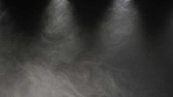 Slow Motions Smoke on a Black Background Professional Studio Light and Smoke Machine