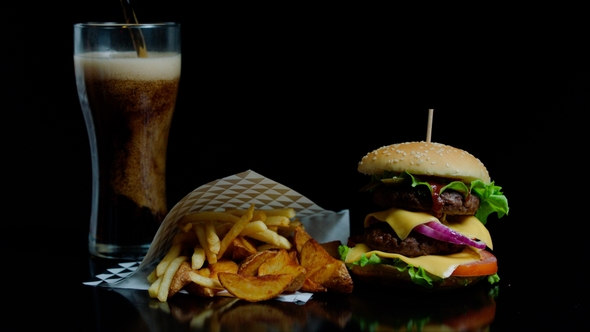 Pouring Glass with Soda and Tasty Burger, French Fries