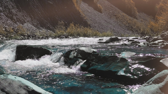 Raging Mountain River. Wildness of Clean, Clear Water in the Mountain River