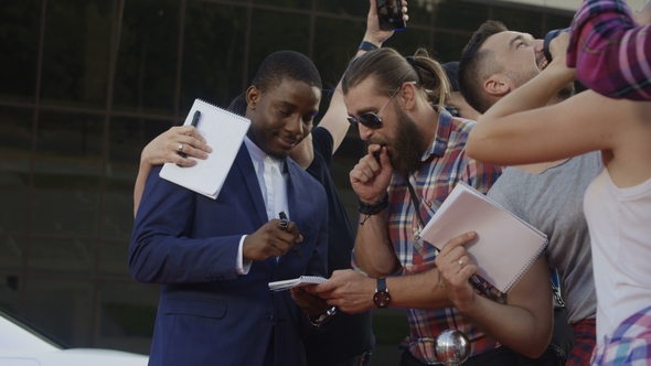 Famous Ethnic Actor Giving Autographs