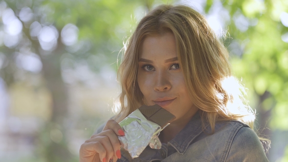 Girl Eating Chocolate