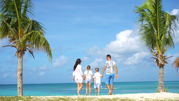 Parents with Two Kids Enjoy Their Caribbean Vacation on Antigua Island