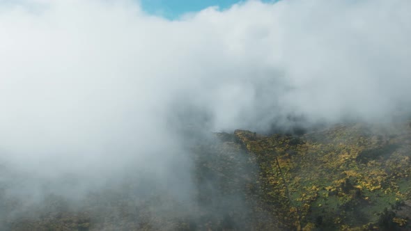 Misty Clouds Covering The Summit Of Pico do Areeiro On Madeira Island, Portugal. Aerial Drone Shot