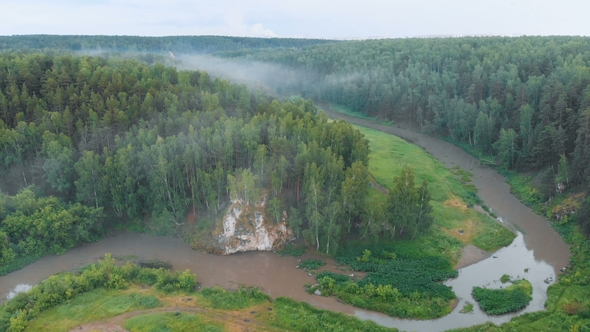 Drone Shot of Morning Fog Over Forests and River Valley