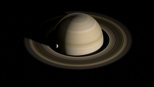 Moon Orbiting around Saturn Planet alt
