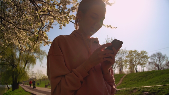 Woman Using App on Smartphone