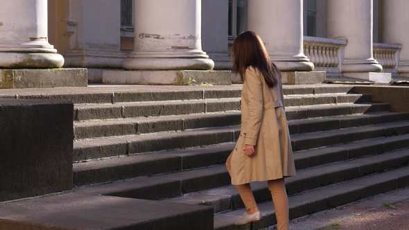 Woman Go Upstairs of Historic House