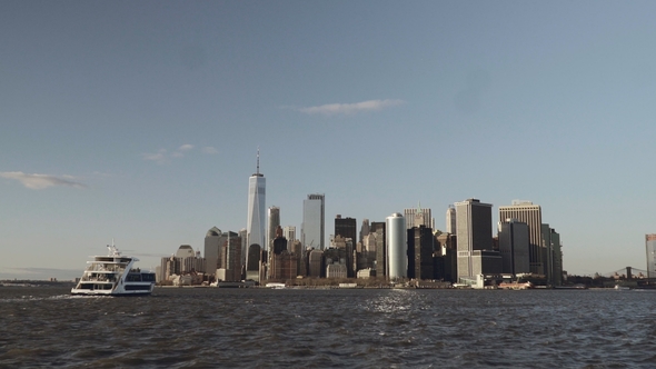 A Boat Approaching Financial Skyscrapers in Downtown New York in Lower Manhattan Filmed From the