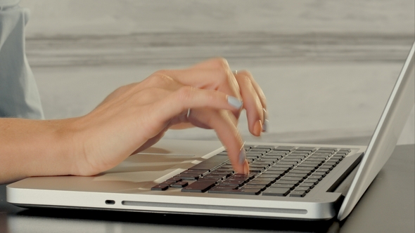 Hands of Business Woman with Keyboard Laptop