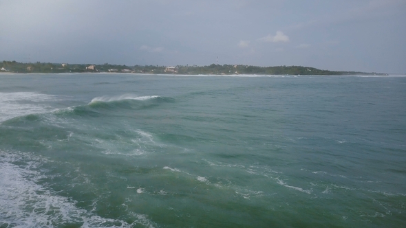 Drone Camera Turns Left To Follow Huge Ocean Wave