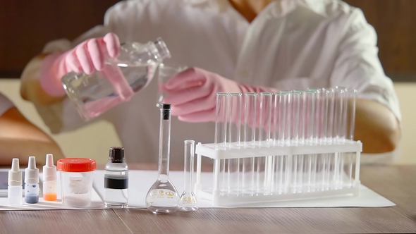 Shooting of a Woman and Her Daughter Working with Chemicals and Doing Experiments Indoor alt