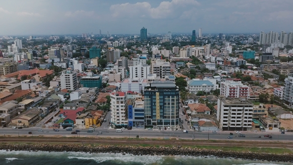 Drone Zooming Out Above Colombo, Sri Lanka Panorama. Aerial View of Asian Resort Town, Modern