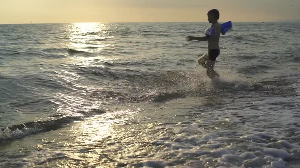 The Boy Runs To the Sea. Slow Motion.