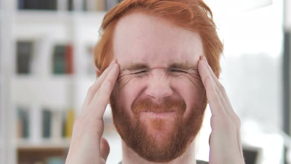 Frustrated Casual Redhead Man with Headache