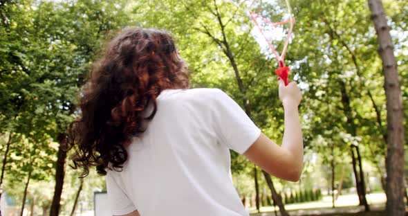 Young One Woman Smiling Carefree Having Fun Blowing