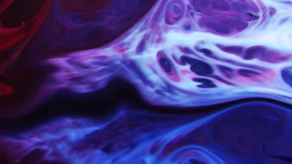 Chemical Liquid Swirl And Paint Reaction Explosion