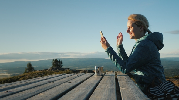 The Traveler Is Talking on Video Chat