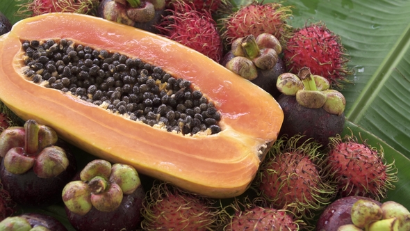 Assortment of Exotic Tropical Thai Fruit Including Papaya, Rambutan and Mangosteen