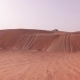 Off-road Cars with Tourists Descend From a High Dune in Rub Al Khali Desert Stock Footage Video - VideoHive Item for Sale