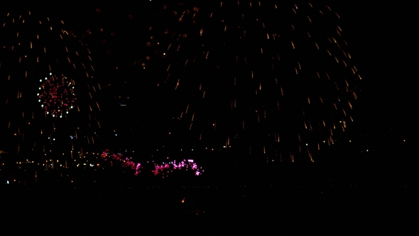 Fireworks Flashing in the Night Holiday Sky