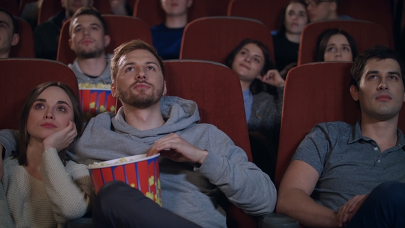 Love Couple Watching Movie in Cinema Theatre. Movie Entertainment