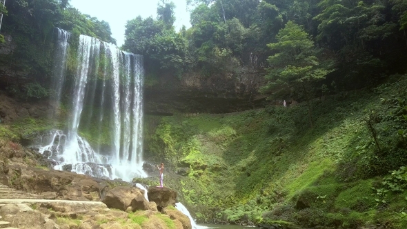 Nature Reserve with Waterfall Between Rocky and Forestry Banks